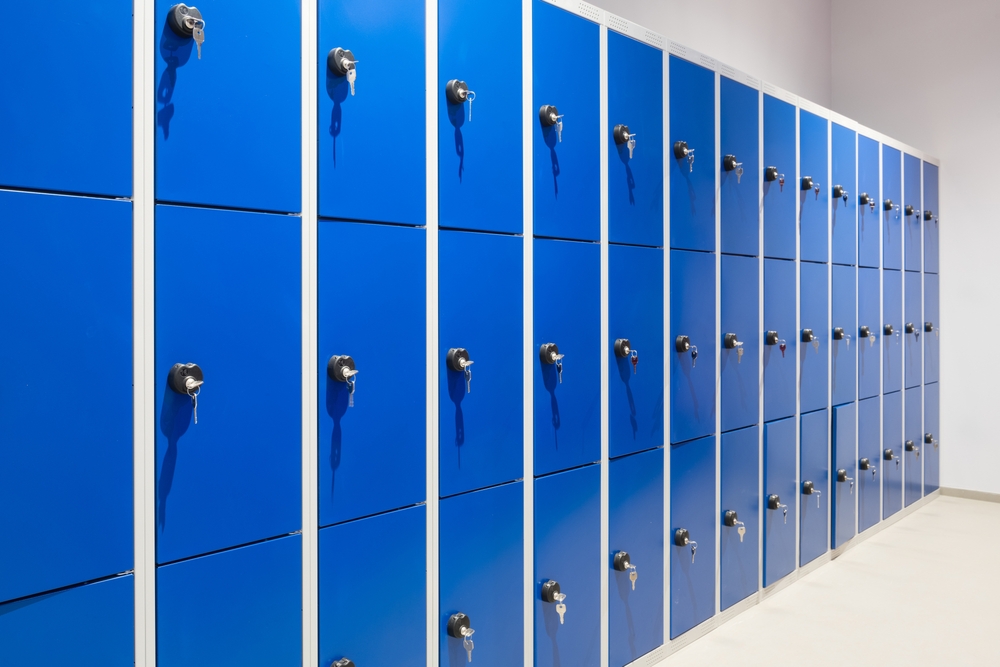Row,Of,Blue,Metallic,Lockers,On,A,Wall,With,Key